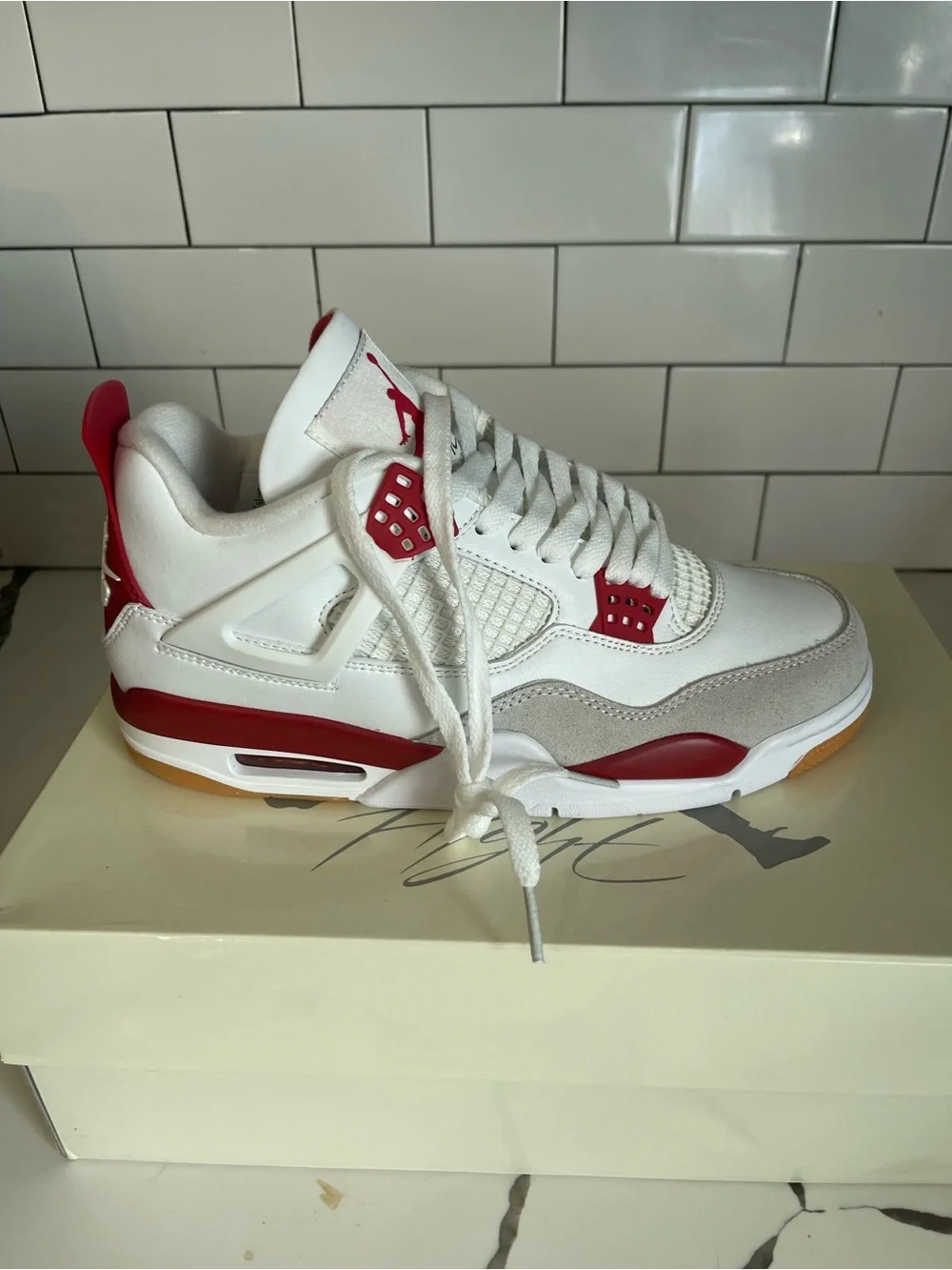 Men’s Retro 4 SB Varsity Red Size 7.5.
